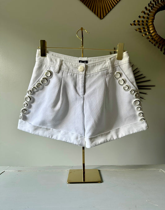 Dolce & Gabbana - Shorts de algodón blancos con detalles de botones.