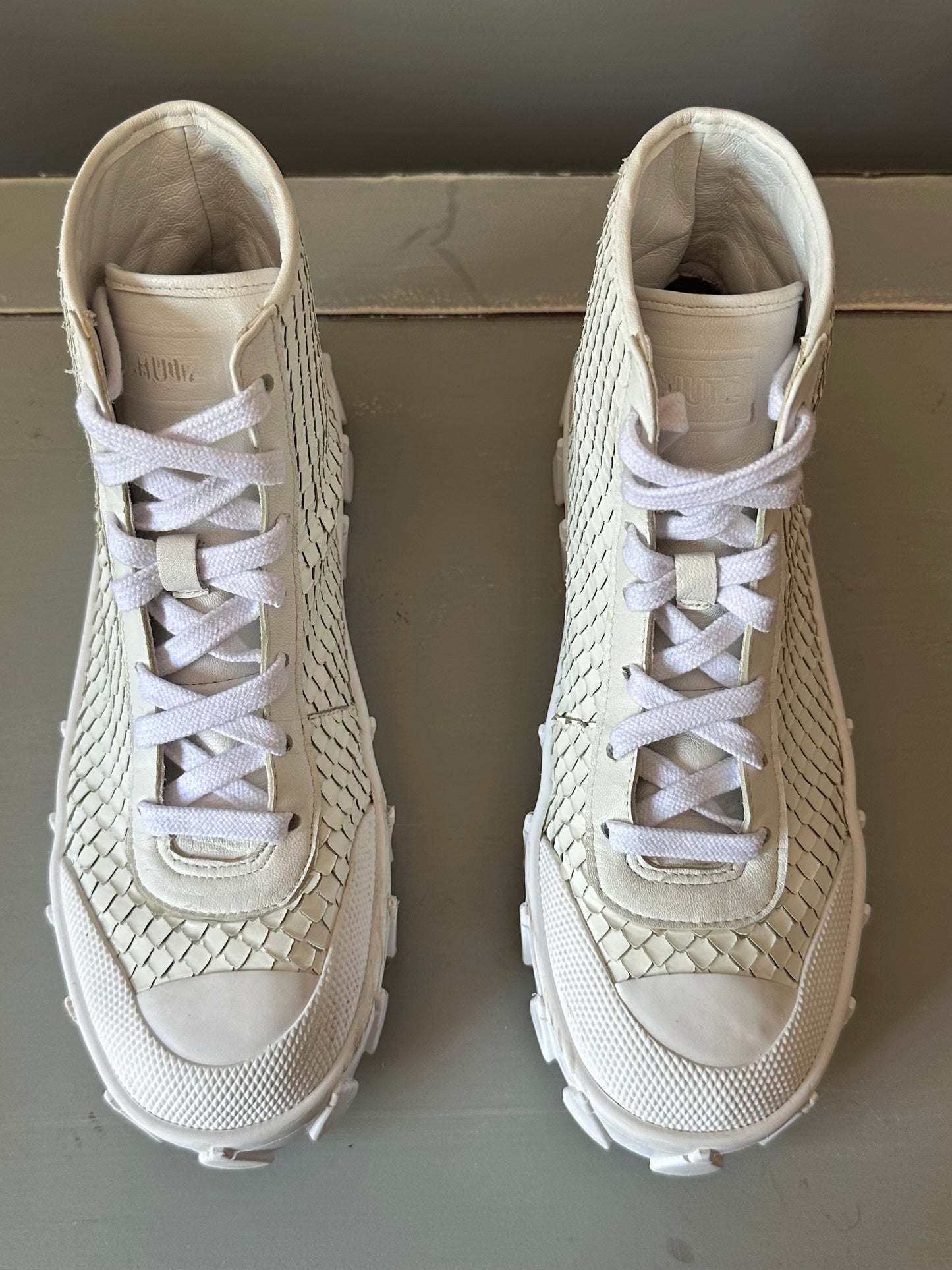 Schutz - Zapatillas deportivas Loomis de piel con adornos de serpiente