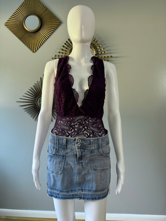 Stella Luce - Body morado con escote en V profundo