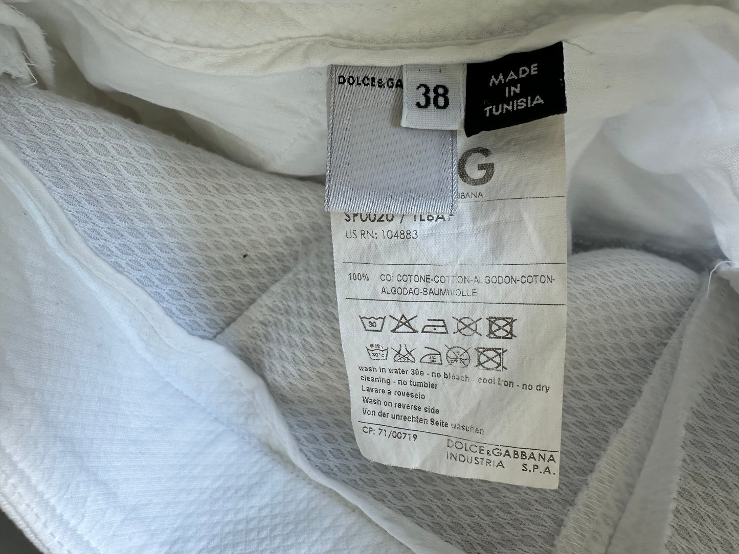 Dolce & Gabbana - Shorts de algodón blancos con detalles de botones.